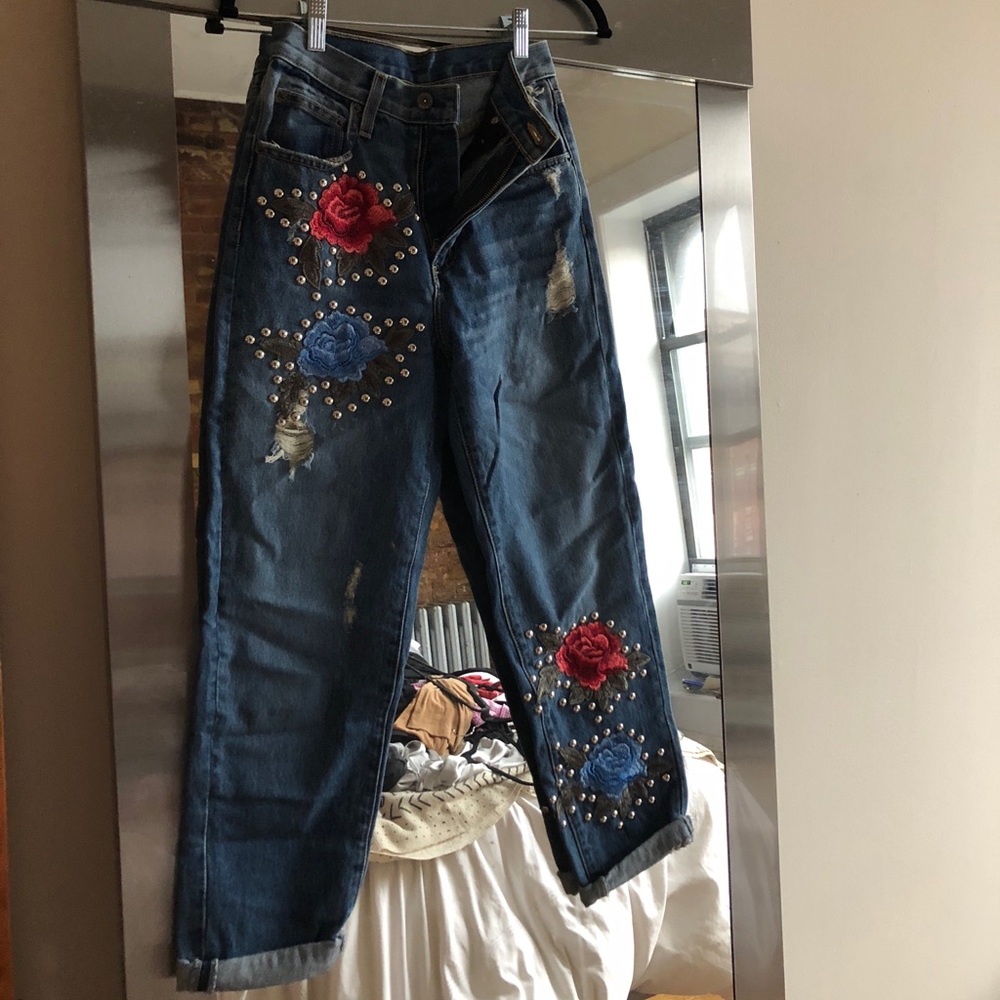 Rose detail blue jeans